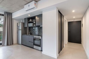 Fridge, microwave, oven, stovetop - Soho Village en Palermo by Magno | 203 (Buenos Aires)