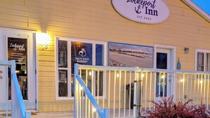 A building with a sign reading 'Lockeport Inn' and 'Salty Dogs Bakery' on the windows. - Lockeport Inn (Lockeport)