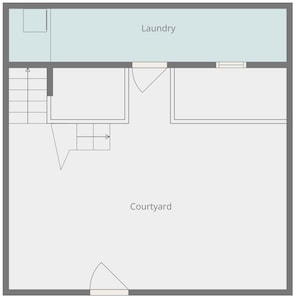 A floor plan with a laundry area and a courtyard.