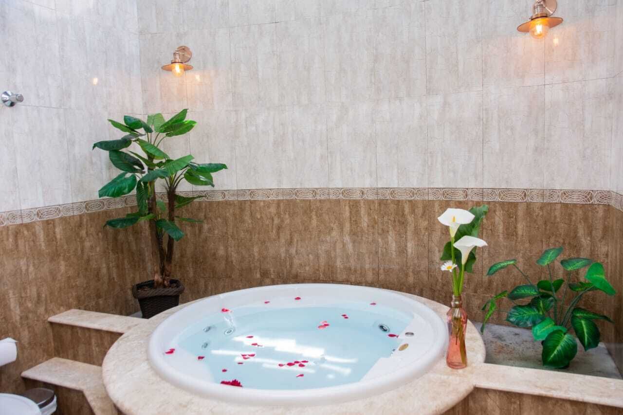 Luxury Chalet, Balcony, Garden View | Private spa tub