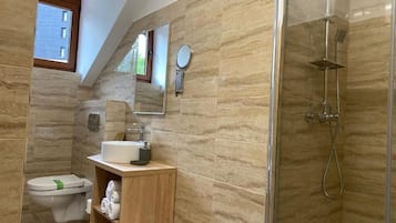 Shower, hair dryer, towels, soap