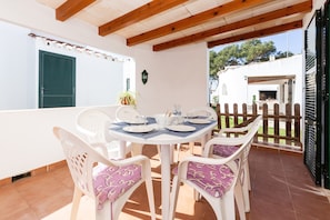 Outdoor dining - Holiday Home 'Sol Del Sur 8' with Shared Pool, Shared Terrace and Wi-Fi (Son Xoriguer)