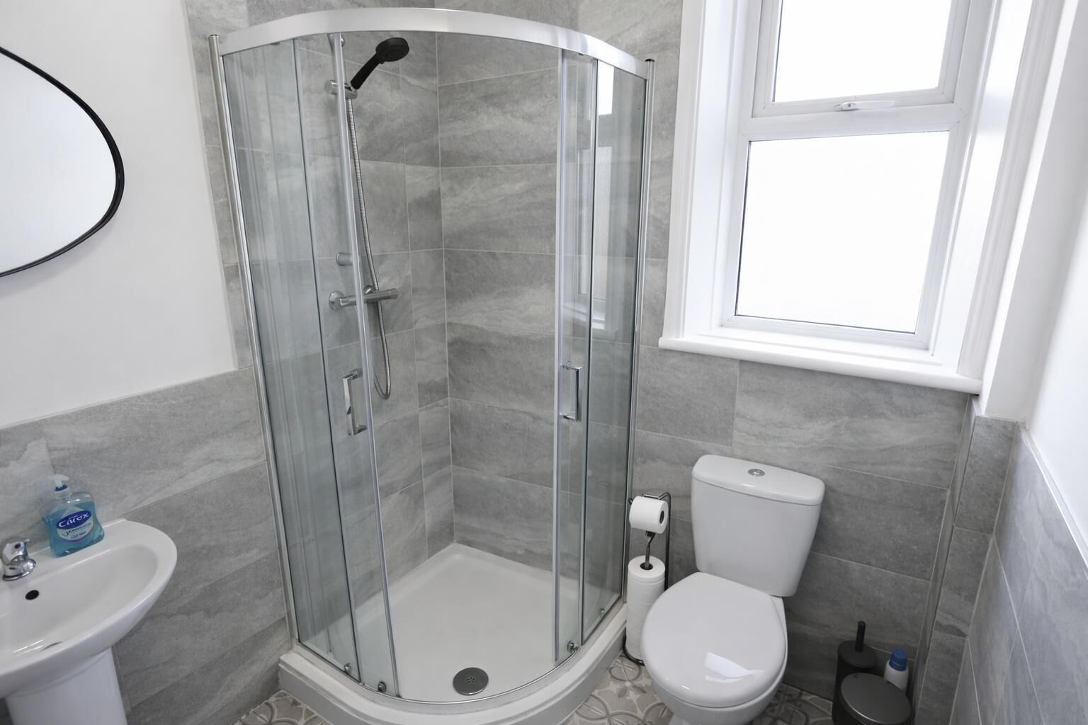 Shower, towels, soap, toilet paper