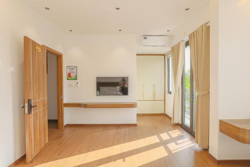 Deluxe Quadruple Room, Balcony, Garden View | Interior