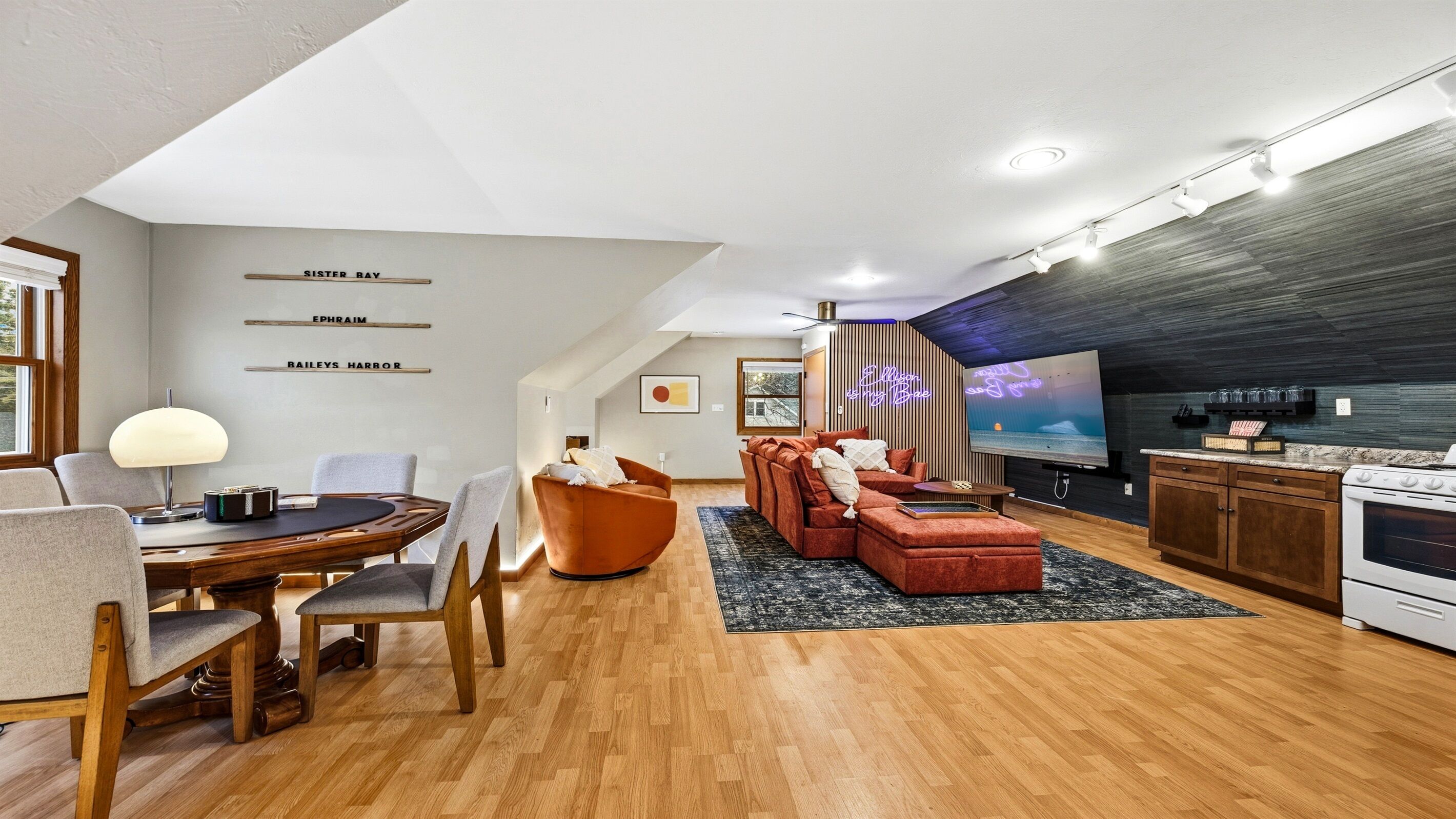 Enjoy foosball, skeeball, arcade games, poker, and more—perfect for friendly competition or laughs. Set the mood with neon lighting, or relax on the sectional for a cozy movie night in front of the 75-inch TV.