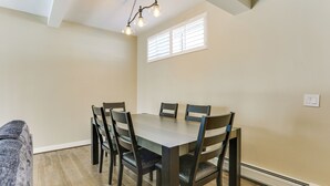 A dining area with a rectangular table, six chairs, and a ceiling light fixture. - Extended Stay in Skylands! Pet-friendly Retreat (Glenwood)