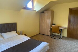 1 chambre, fer et planche à repasser, accès au Wi-Fi (inclus)