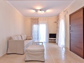 TV - Fotinia Beach House Ground Floor by RentalsPro (Paralia Dionisiou)
