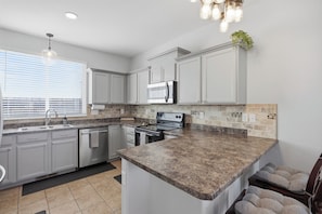 Fridge, microwave, oven, stovetop - Private King Bed Suite/Modern Stay near COS Airport (Colorado Springs)