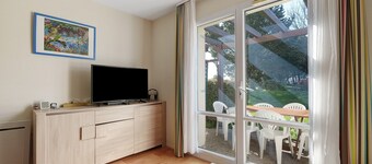 « Cottage, Piscine et Vue sur Golf » avec Piscine Partagée, Terrasse Privée et Wi-Fi