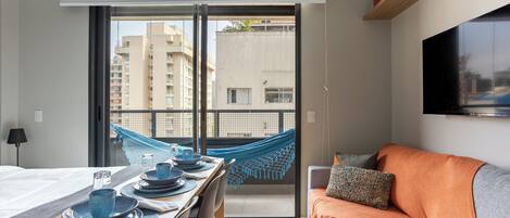 Deluxe Apartment, Kitchen, City View | Living area