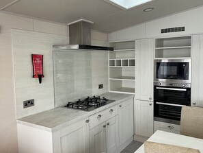 Private kitchen - Primrose front row sea view. Dogs stay free. Rockley Park, Poole, Dorset. (Poole)