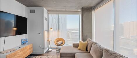 Appartement Deluxe, 3 chambres, vue ville | Coin séjour