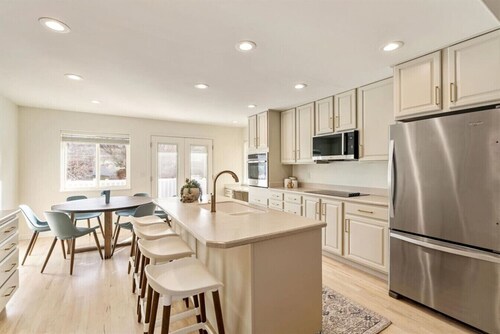 A newly renovated mountain basecamp with two king suites, perfect for families exploring American Fork Canyon.