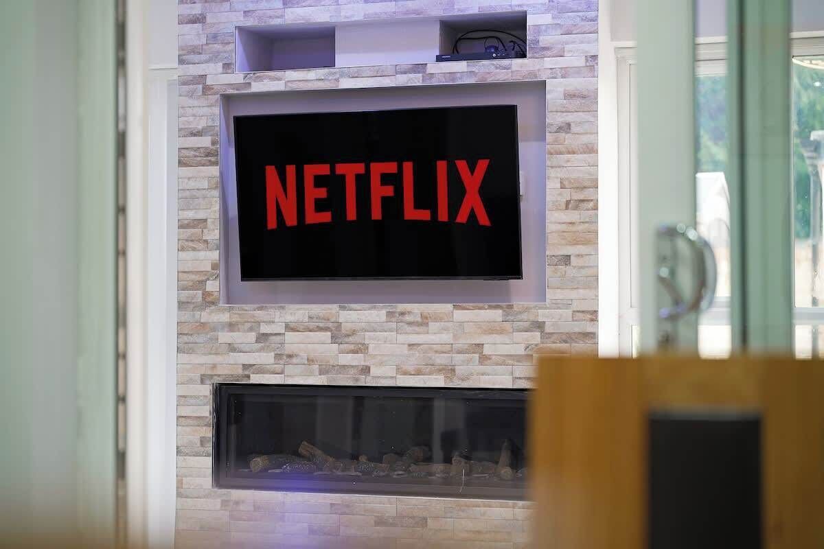 A wall-mounted television with the Netflix logo.