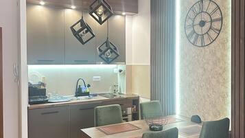 Appartement Deluxe, balcon, vue montagne | Restauration