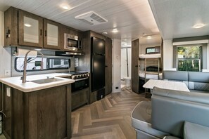 Private kitchen - Cozy Camper with Canal access (Cross)