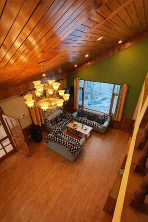 Living area - Welcome to Golden Grove – your peaceful escape where comfort meets nature.” (Manali)