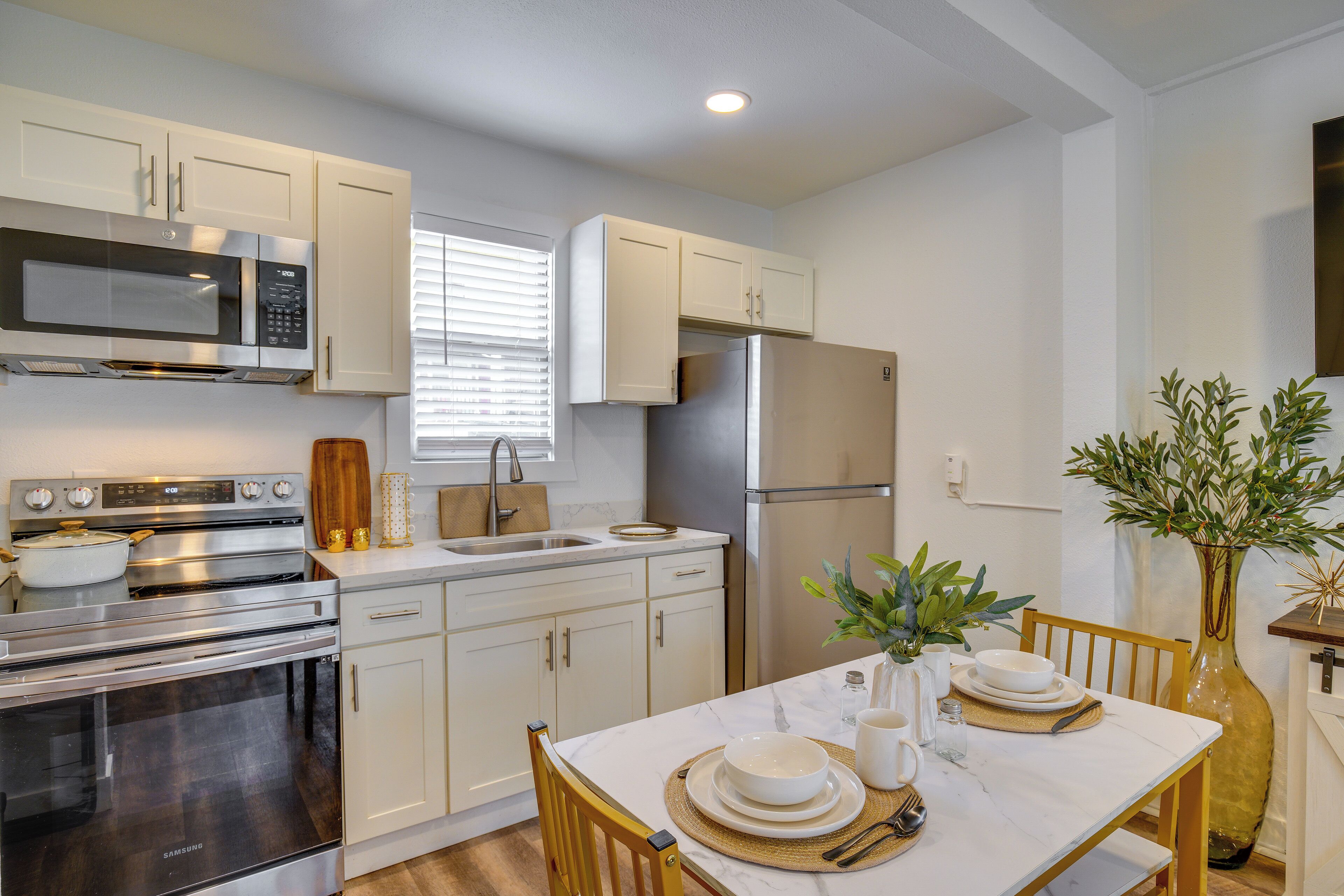 Fridge, microwave, stovetop, coffee/tea maker
