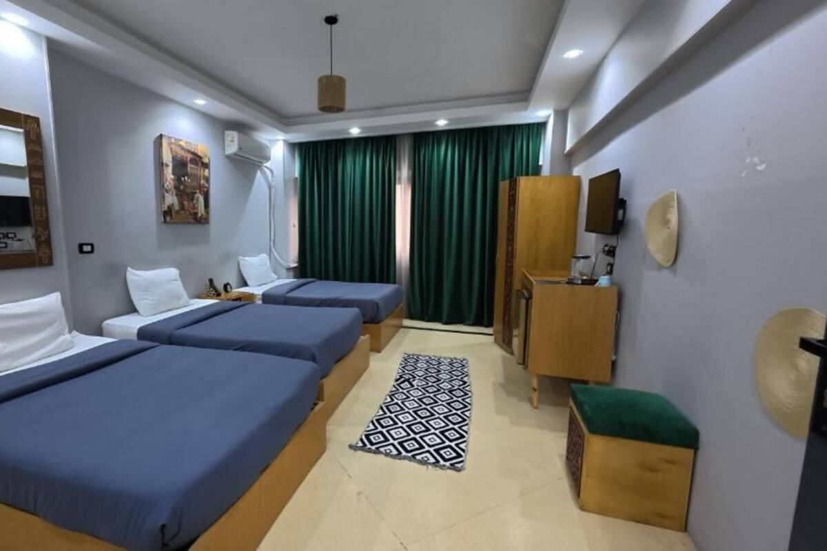 Deluxe trippelrum - utsikt mot staden