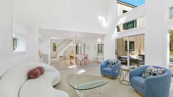 Villa, 3 Bedrooms, Pets Allowed, Pool View | Living area | 75-inch LED TV with digital channels, fireplace, foosball