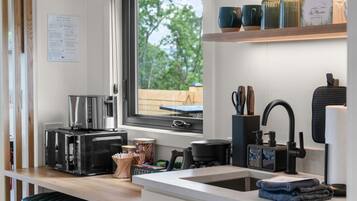 Microwave, stovetop, coffee/tea maker, toaster