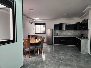 Deluxe Apartment, City View | Private kitchen - Hotel Boutique Batara (Filandia)