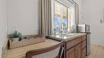 Fridge, microwave, coffee/tea maker, toaster