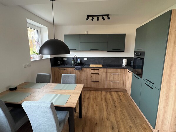 Private kitchen - Modern, cozy vacation rental in Nieste with a terrace & views of the countryside (Nieste)