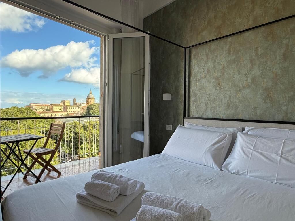 Exclusive-Vierbettzimmer, Balkon, Stadtblick