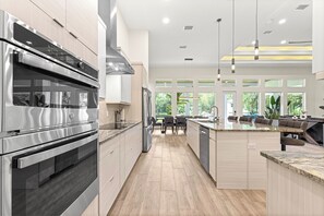 Fridge, microwave, oven, stovetop - Rainbow Retreat Luxury Escape: 2 Homes, 11 Bedrooms, Perfect for Big Groups! (Dunnellon)