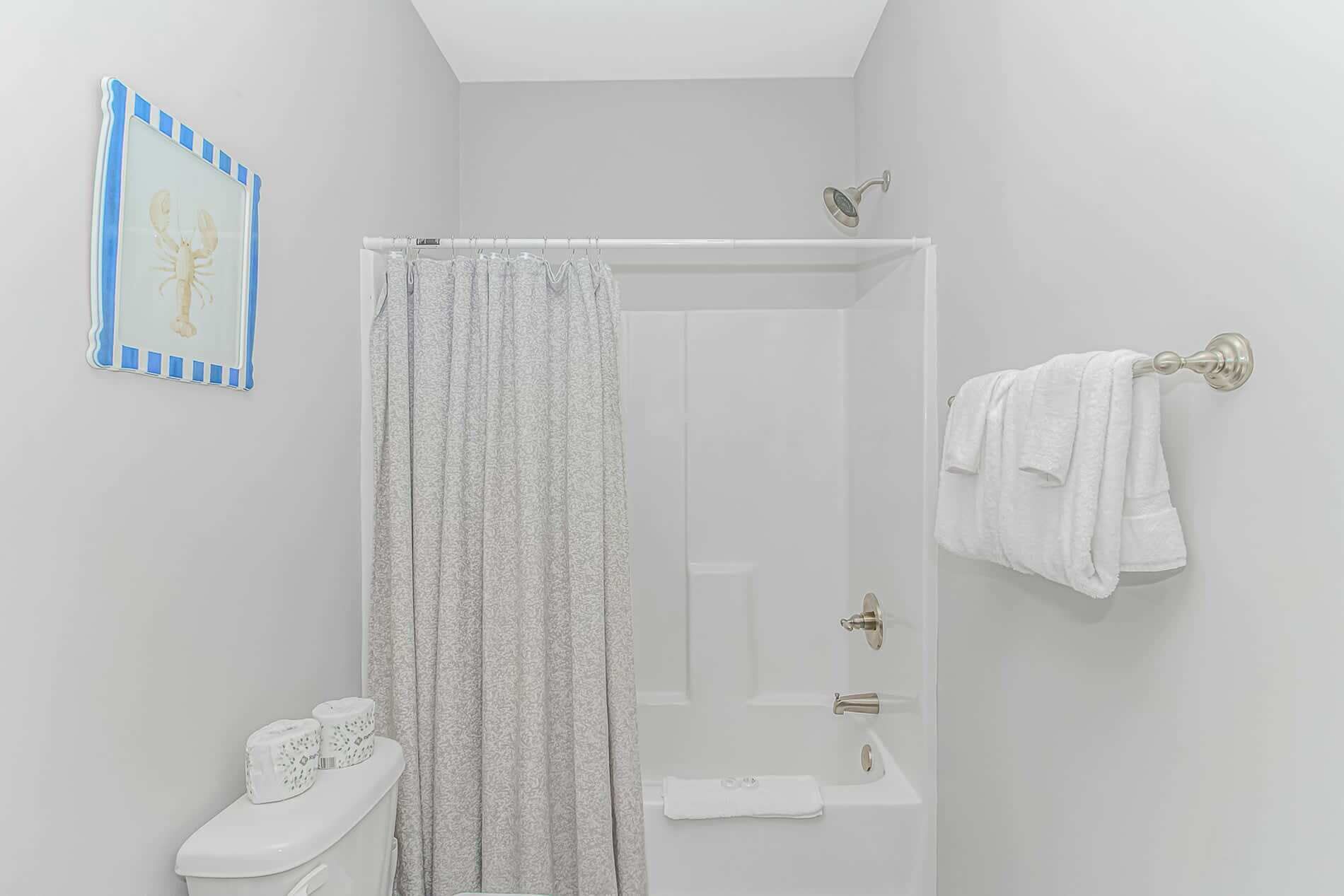 Shower, hair dryer, towels, shampoo