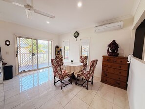 Dining - Comfortable 2-Bedroom Unit with A/C, Kitchen, and Large-Screen TV — Plus Parking (Munruben)