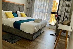 6 habitaciones, tabla de planchar con plancha, internet y ropa de cama 