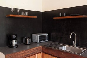 Fridge, microwave, coffee/tea maker, toaster - Modern 1-bedroom studio with Sunken Pool, AC and gym access in La Veleta, Tulum (Tulum)