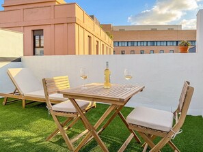 Outdoor dining - GuestReady - Casa Boutique Plaza de Armas (Sevilla)