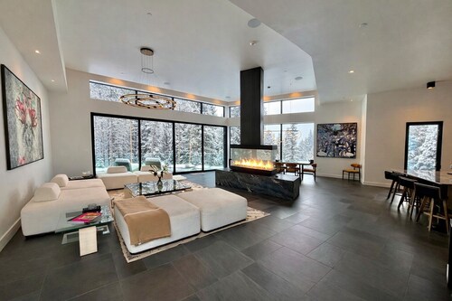 Steps to slopes; 7,000 sq feet of Luxury, golf simulator, hot tub!