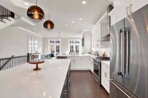 Fridge, microwave, oven, stovetop - Luxury Riverfront Retreat in the Eastern Wharf | Heated Pool Access (Savannah)