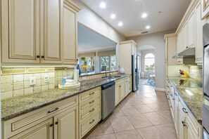 Luxury Condo, Partial Ocean View | Private kitchen - Holmes Beach Shoreline Suites (Holmes Beach)