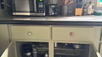 Fridge, microwave, stovetop, coffee/tea maker