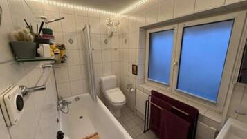 Hair dryer, bidet, towels, toilet paper