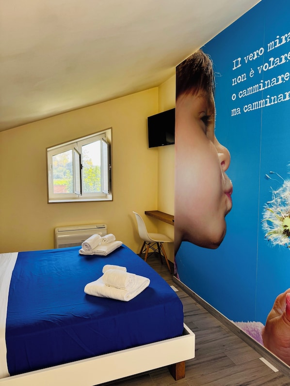 Neljän hengen deluxe-huone