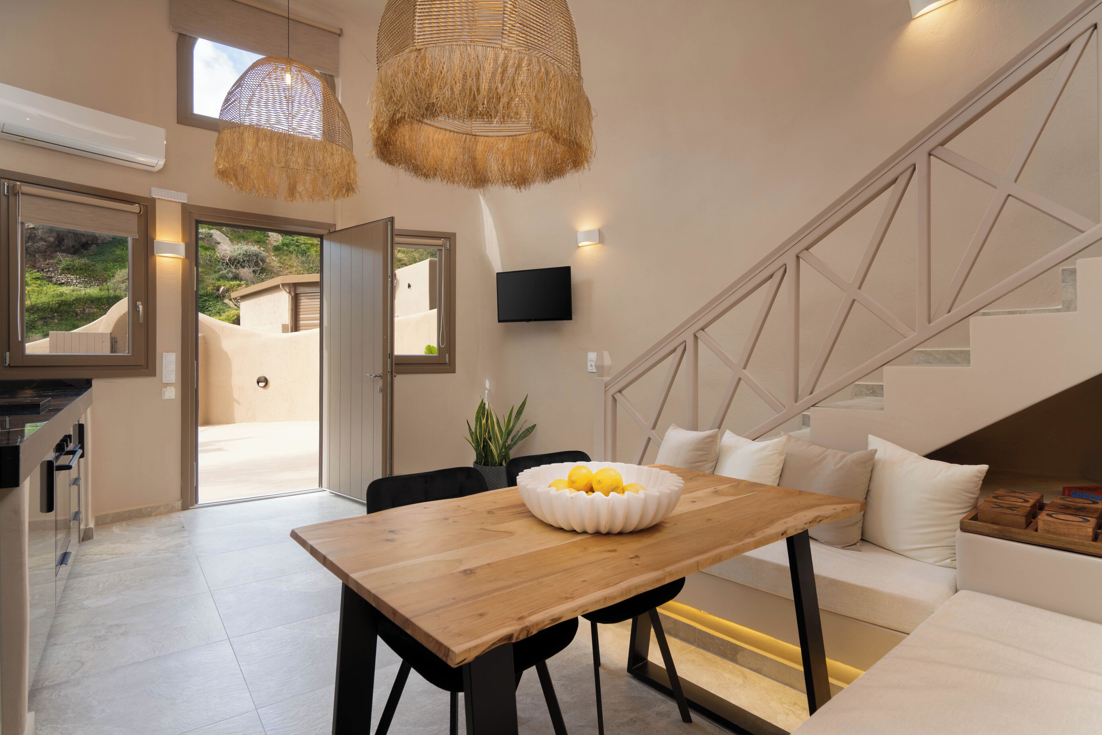 Two Bedroom Cave Villa with Sea View and Private Pool | Living area | 43-inch Smart TV with digital channels, Netflix, streaming services