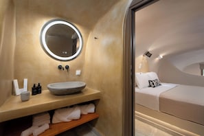 Two Bedroom Cave Villa with Sea View and Private Pool | Bathroom | Shower, rainfall showerhead, free toiletries, hair dryer - Litheos Santorini Luxury Cave Suites (Vourvoulos)