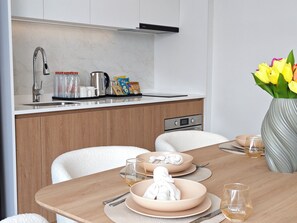 Junior Suite, Balcony, Garden View | Private kitchen - The Village Chumphon Hotel (Pathiu district)