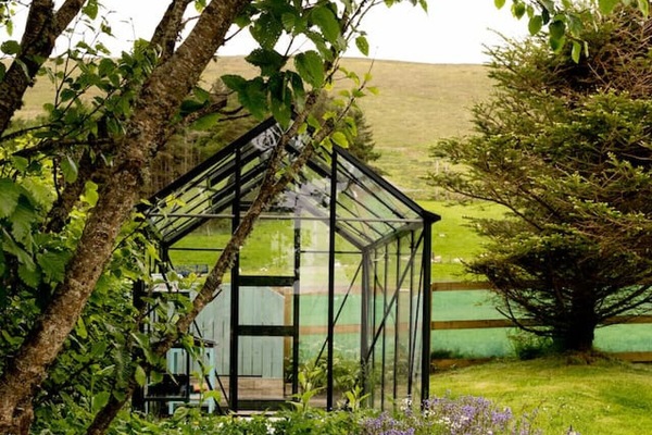 Greenhouse set within the enclosed garden