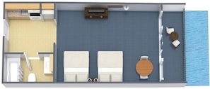 Eine Zwei-Zimmer-Suiten mit Balkon, einer Küchenzeile, einem Badezimmer und einem Sitzbereich mit Meerblick.