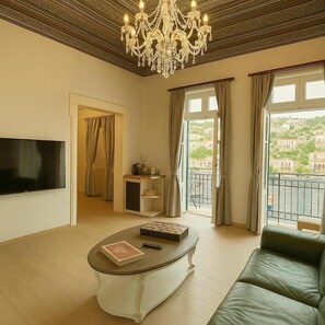 Apartamento Deluxe, balcón, vistas al mar | Zona de estar