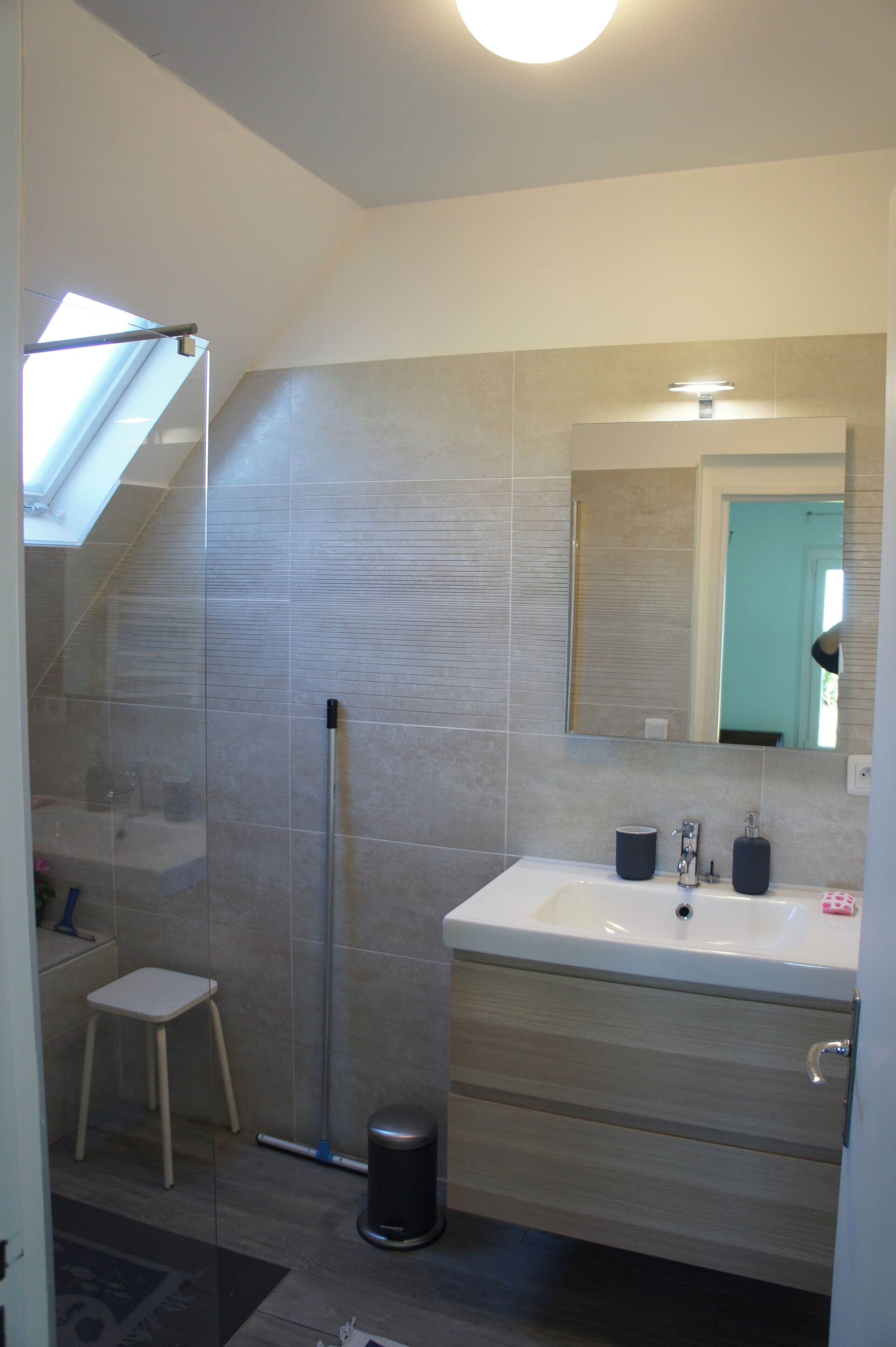 Shower, hair dryer, towels, toilet paper