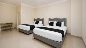 Deluxe Suite | Free WiFi, bed sheets - Collection O near Stasiun Cawang formerly Griya Harita Syariah (Jakarta)